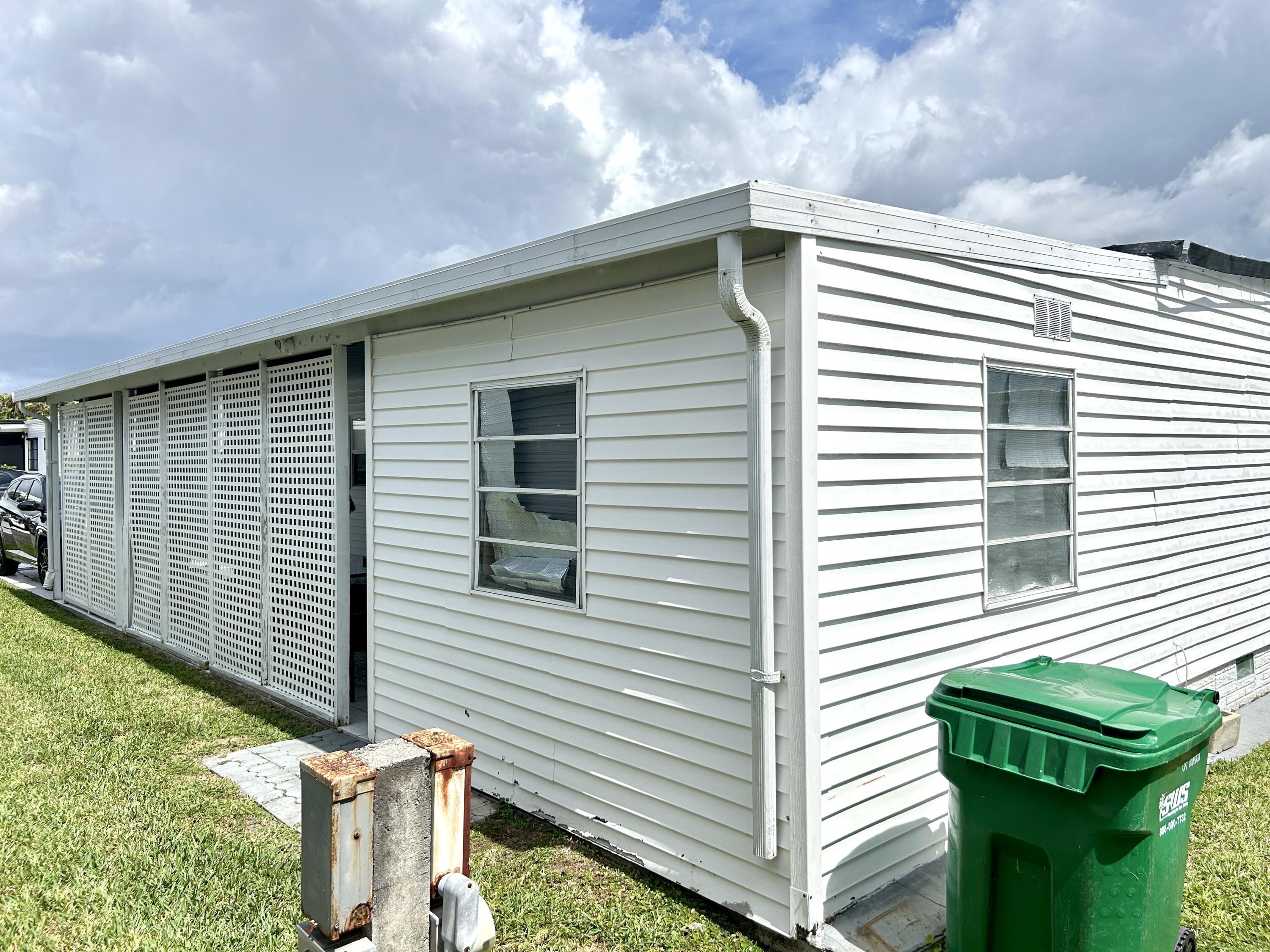 3240 State Street Hollywood, FL 33021 - Photo 29 of 29 a view of a backyard with a deck