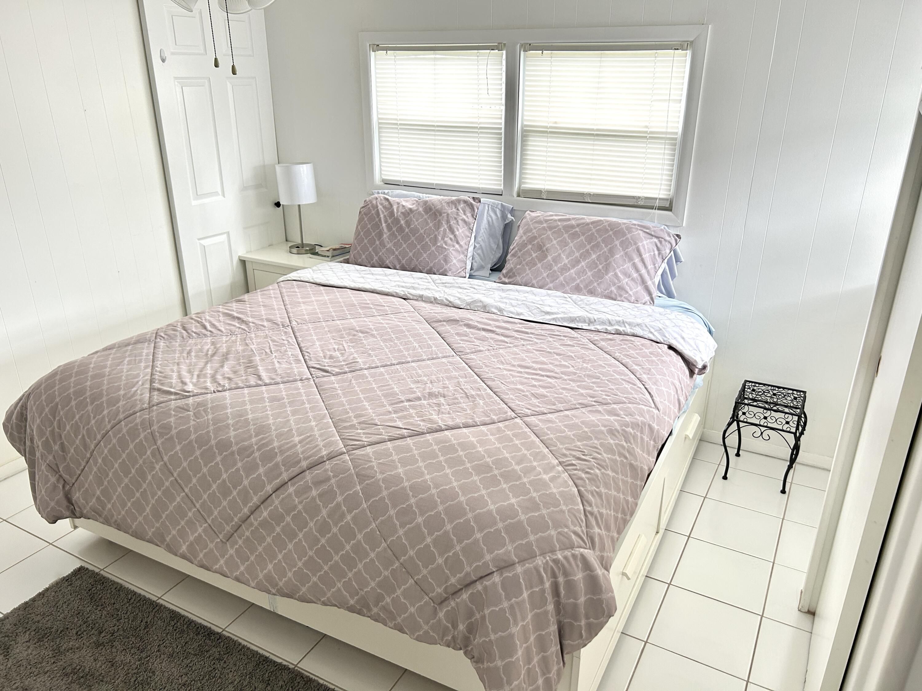 3240 State Street Hollywood, FL 33021 - Photo 3 of 29 a bedroom with a bed and a window