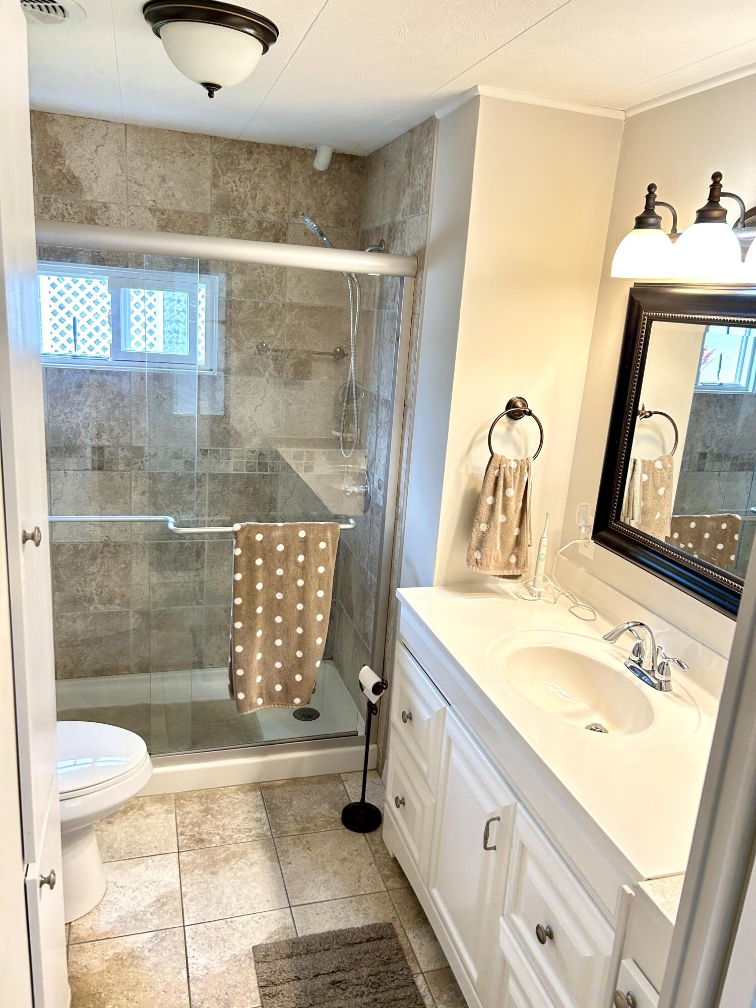 3240 State Street Hollywood, FL 33021 - Photo 6 of 29 a bathroom with a sink a toilet and shower