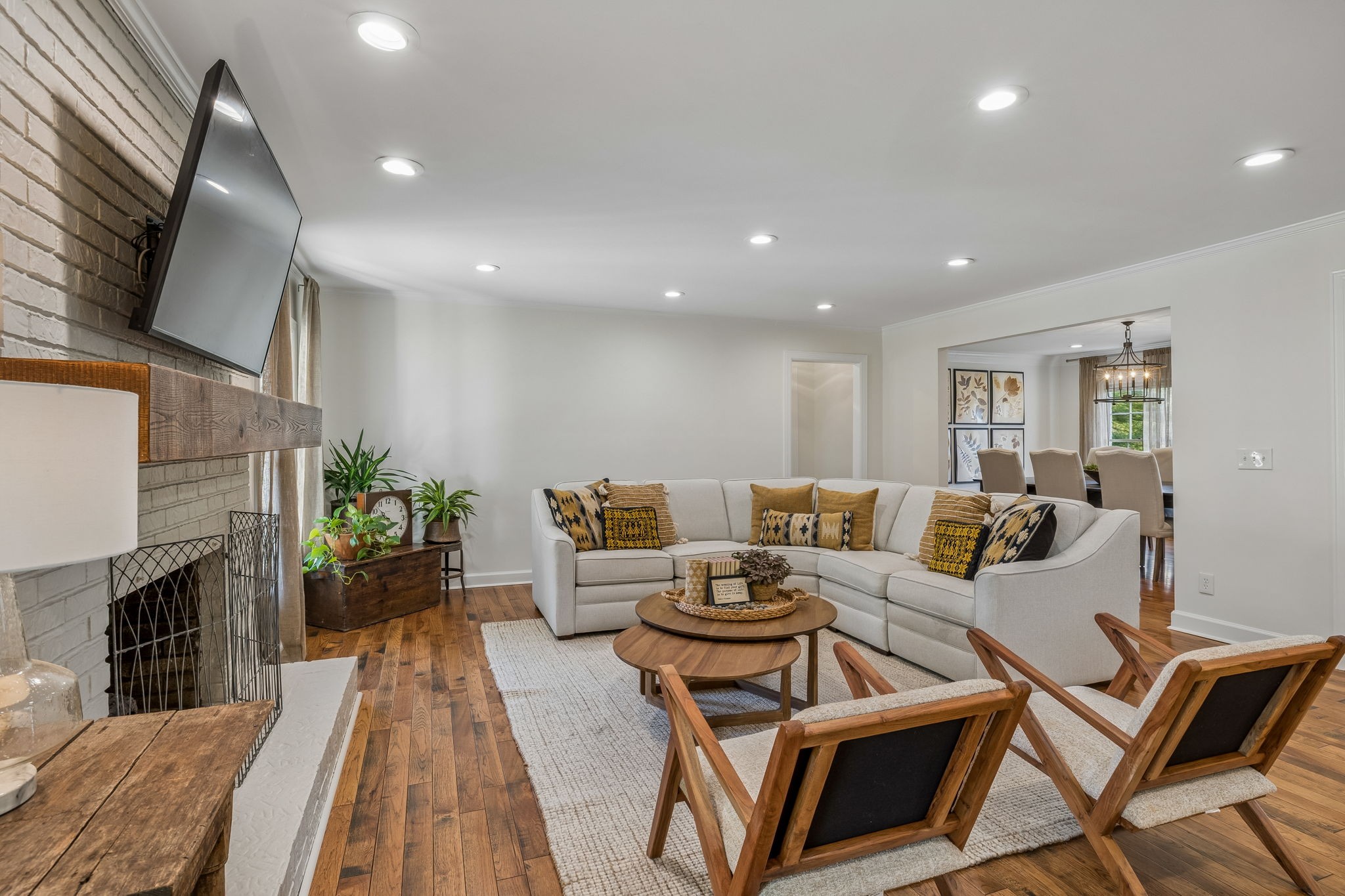 3007 Braintree Road Franklin, TN 37069 - Photo 12 of 71 a living room with furniture a fireplace and a flat screen tv