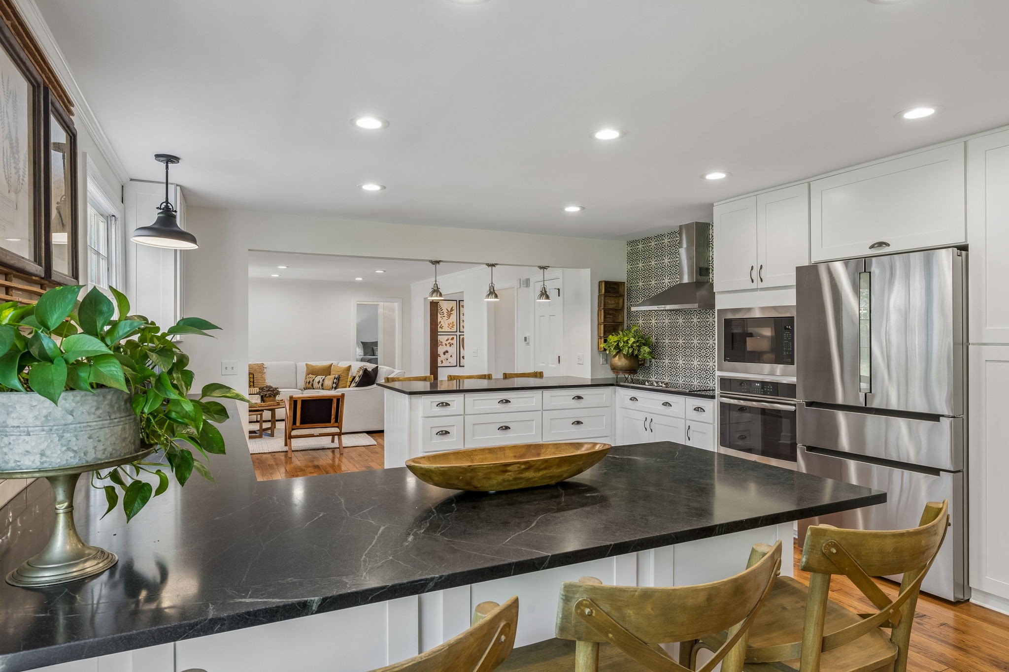 3007 Braintree Road Franklin, TN 37069 - Photo 22 of 71 a kitchen with stainless steel appliances granite countertop a sink a refrigerator and a counter space