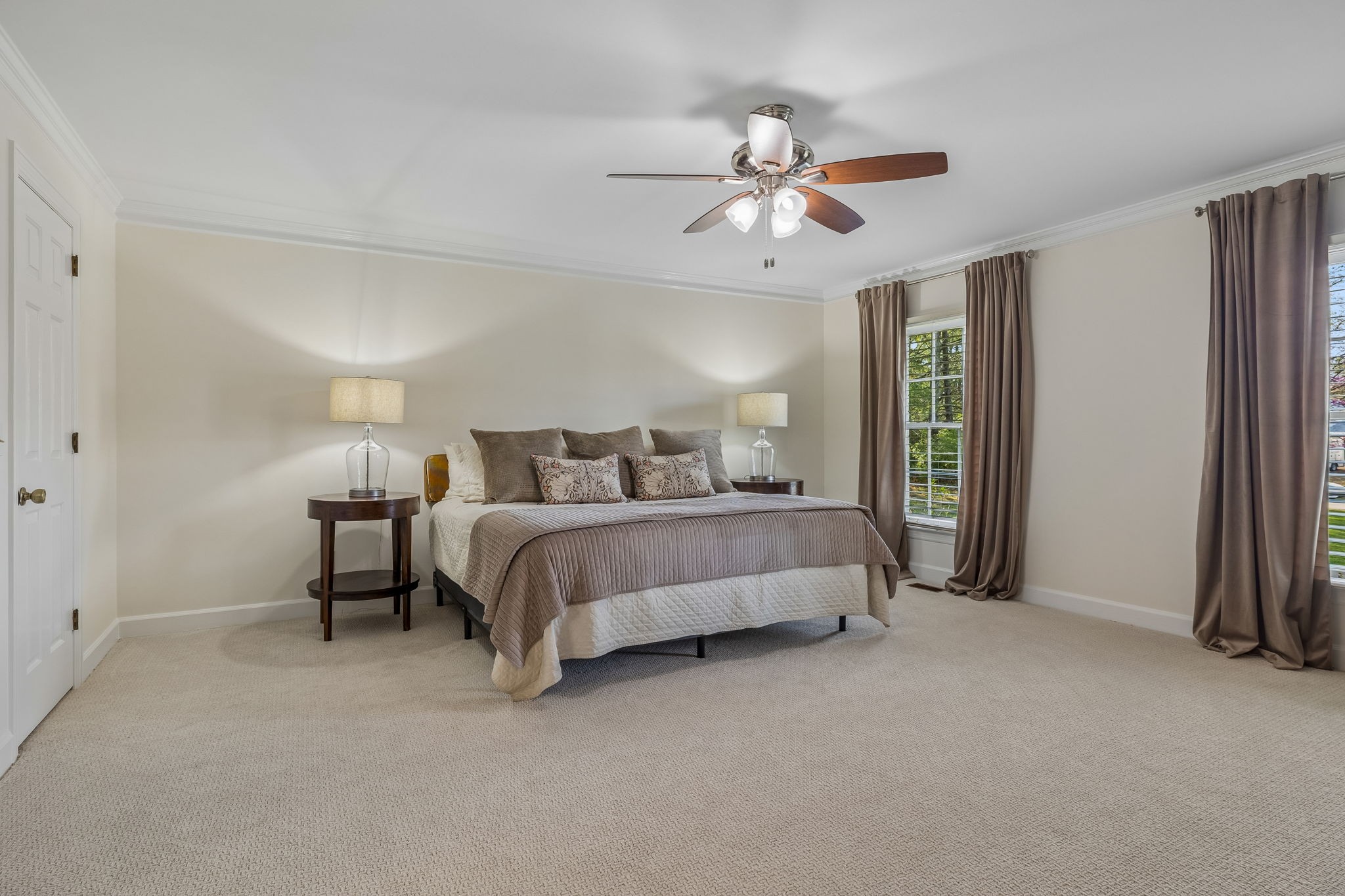 3007 Braintree Road Franklin, TN 37069 - Photo 27 of 71 a bedroom with a bed and a chandelier
