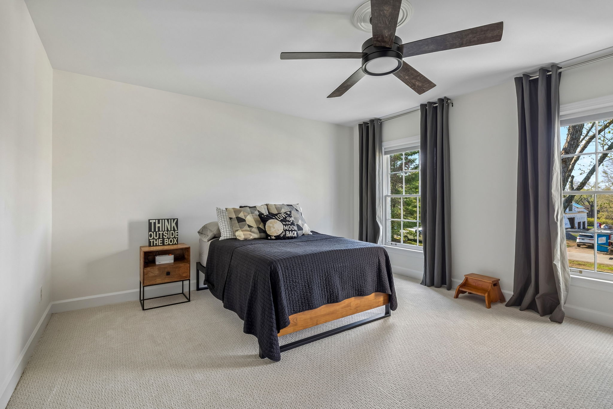 3007 Braintree Road Franklin, TN 37069 - Photo 36 of 71 a bedroom with a bed and a chandelier