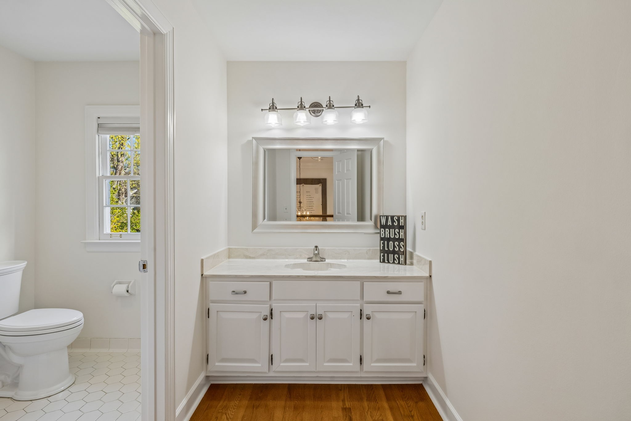 3007 Braintree Road Franklin, TN 37069 - Photo 41 of 71 a bathroom with a sink toilet and window