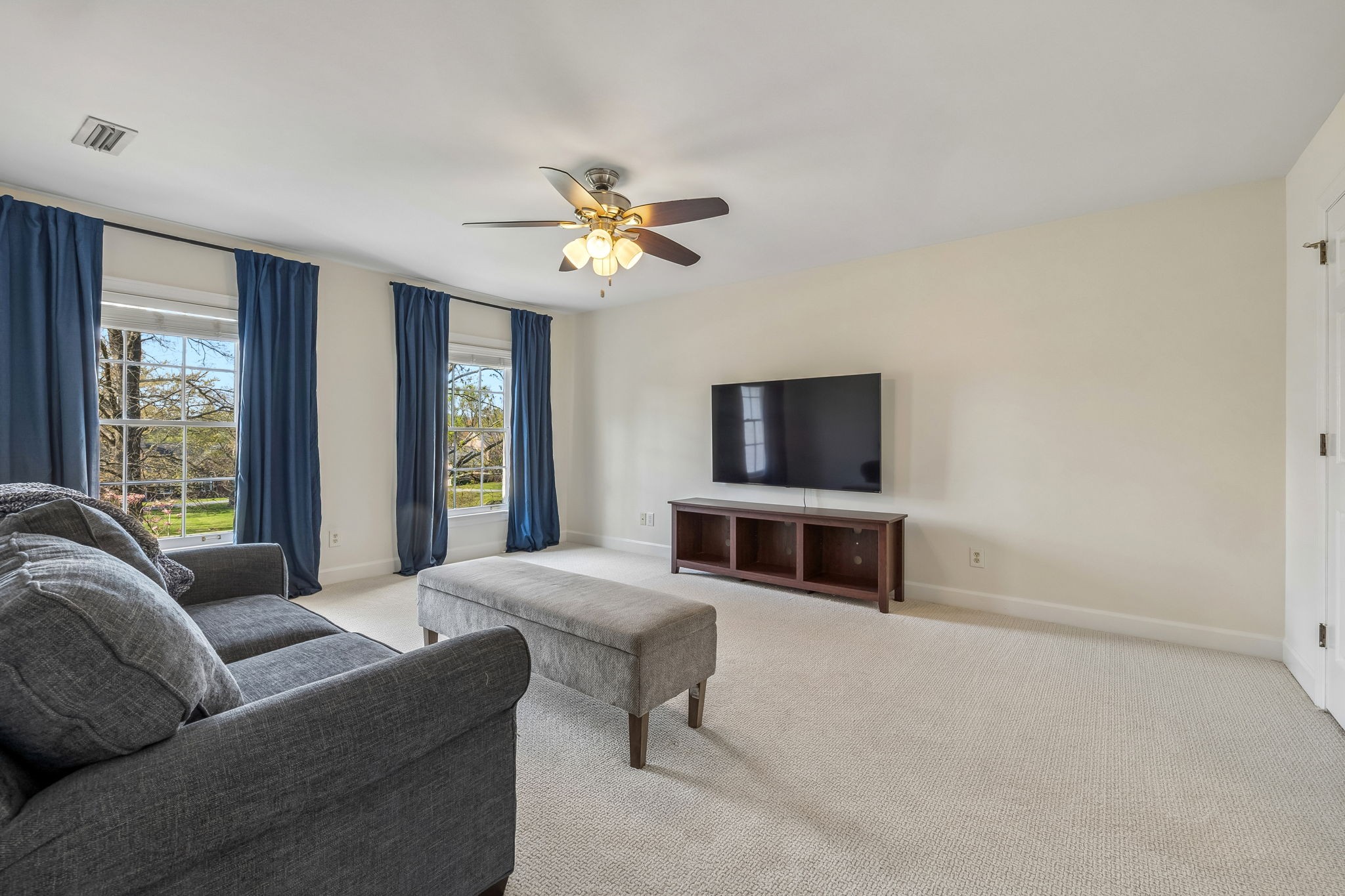 3007 Braintree Road Franklin, TN 37069 - Photo 42 of 71 a living room with furniture and a flat screen tv
