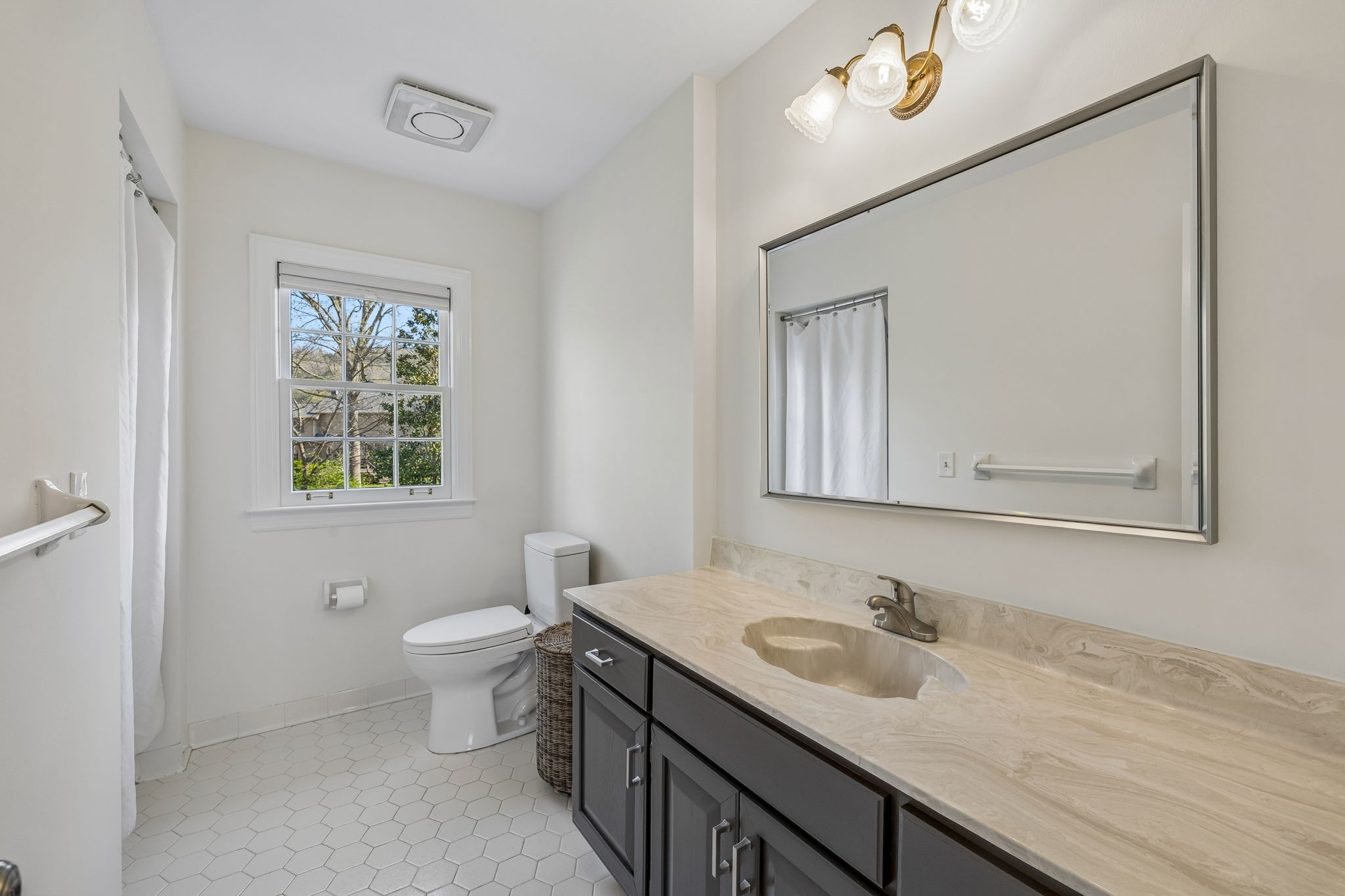 3007 Braintree Road Franklin, TN 37069 - Photo 44 of 71 a bathroom with a granite countertop sink toilet and mirror