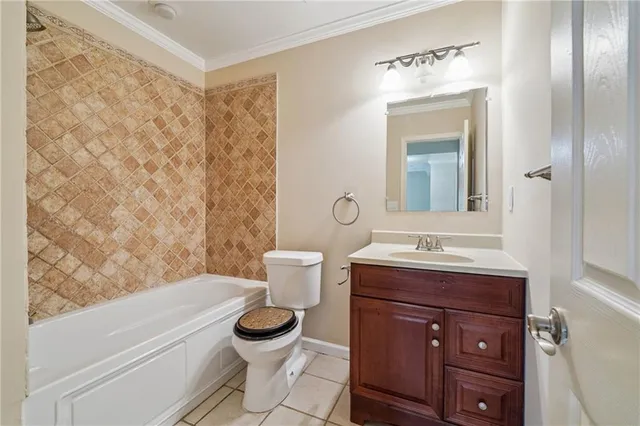 an aerial view of residential houses with outdoor space and street view