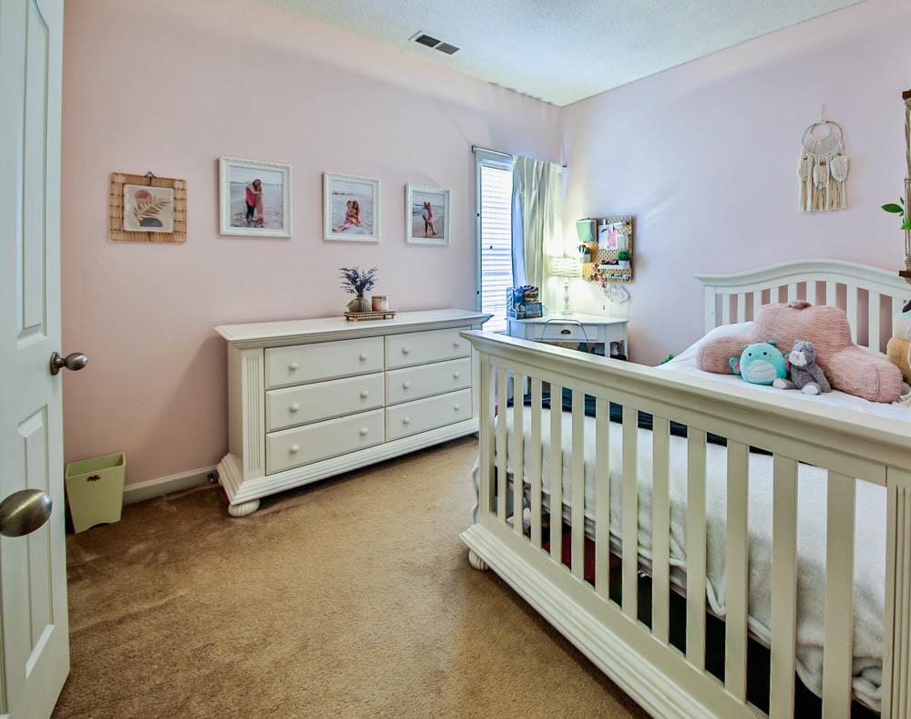 4964 Shaws Ridge Trail Arlington, TN 38002 - Photo 12 of 20 a bedroom with furniture and a window