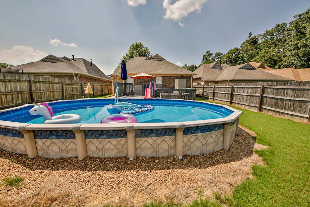 4964 Shaws Ridge Trail Arlington, TN 38002 - Photo 18 of 20 a view of swimming pool with outdoor seating
