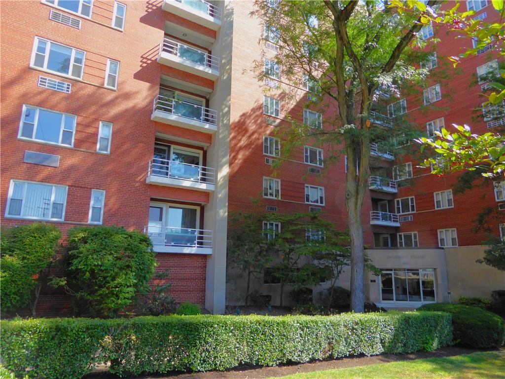 4601 Fifth Avenue, Unit 623 Pittsburgh, PA 15213 - Photo 1 of 24 a view of a brick building next to a yard