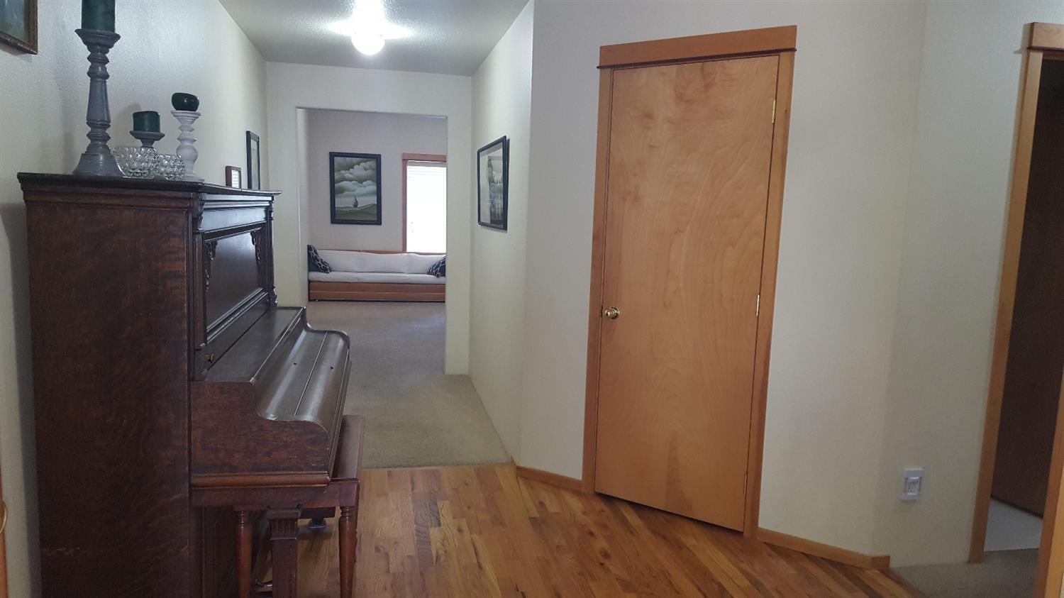 15 Logan Way Talent, OR 97540 - Photo 3 of 9 a view of hallway with wooden floor