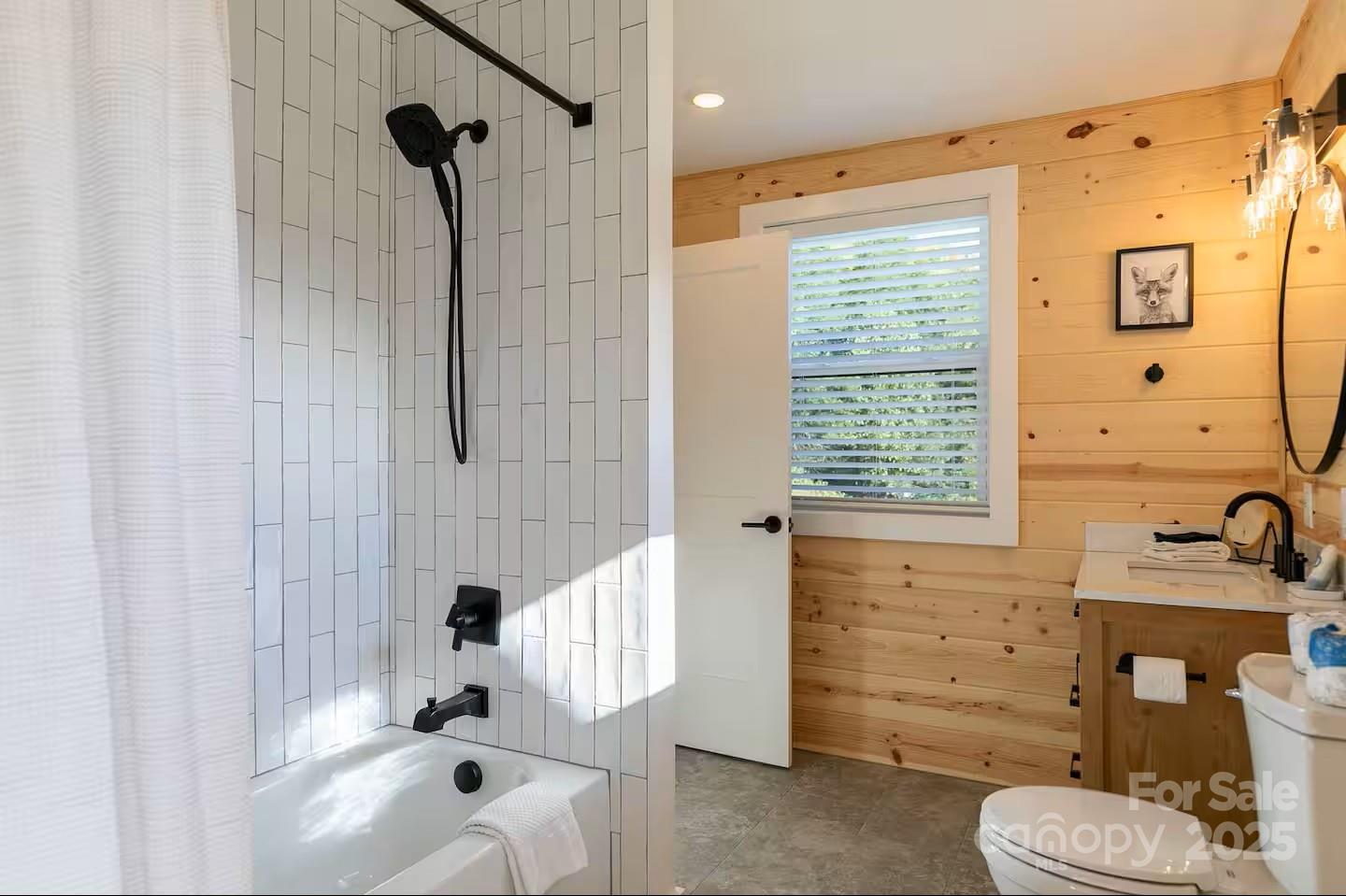 4612 Shulls Mill Road Blowing Rock, NC 28605 - Photo 15 of 35 a bathroom with a sink a toilet and shower
