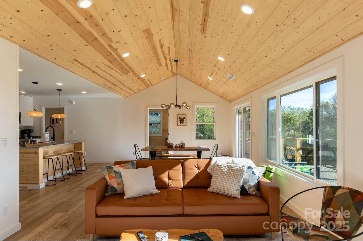 4612 Shulls Mill Road Blowing Rock, NC 28605 - Photo 7 of 35 a living room with furniture and a large window