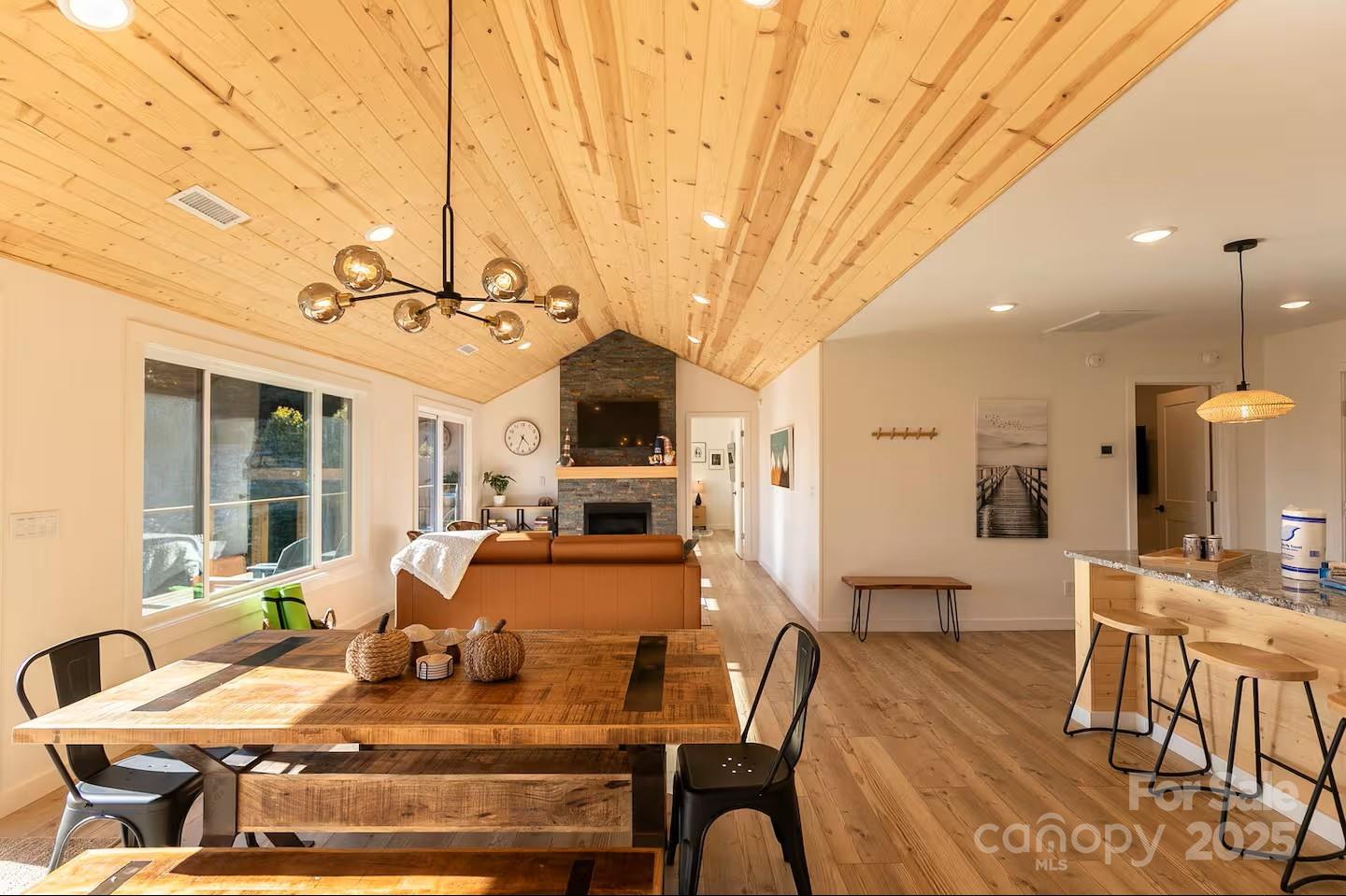 4612 Shulls Mill Road Blowing Rock, NC 28605 - Photo 8 of 35 a view of a dining room with furniture window and outside view