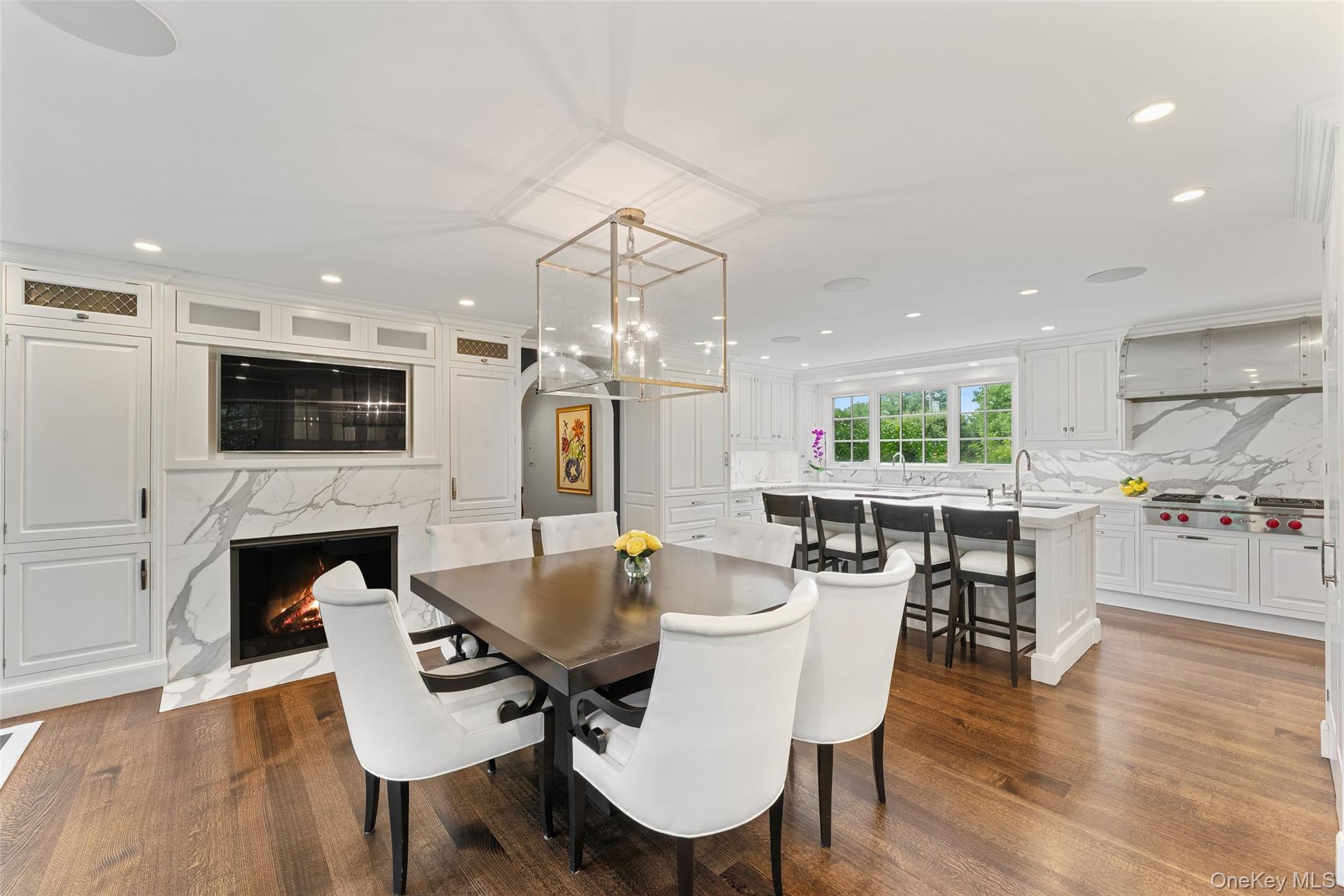21 Dolma Road Scarsdale, NY 10583 - Photo 6 of 46 View of breakfast room overlooking gas fireplace