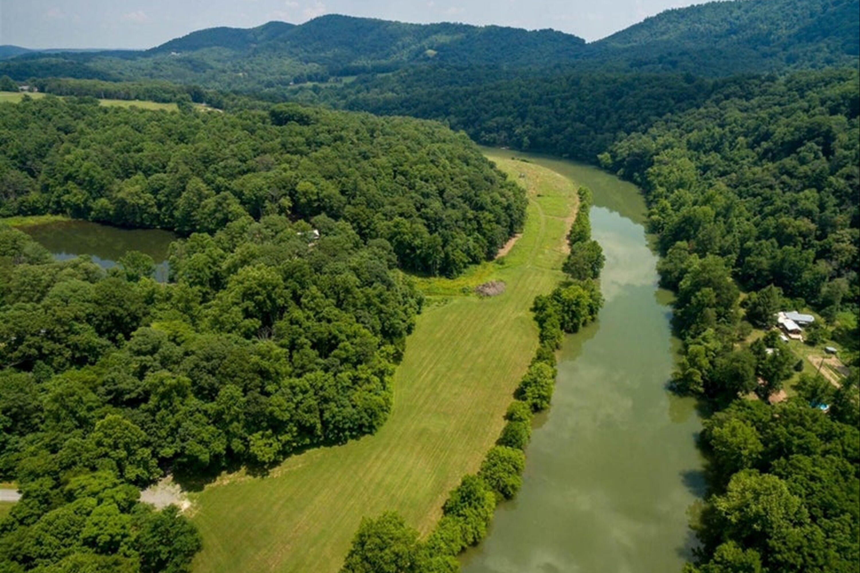 Lot 2 Winding Timber Lane Vinton, VA 24179 - Photo 17 of 21 a view of a lush green forest with a lake view