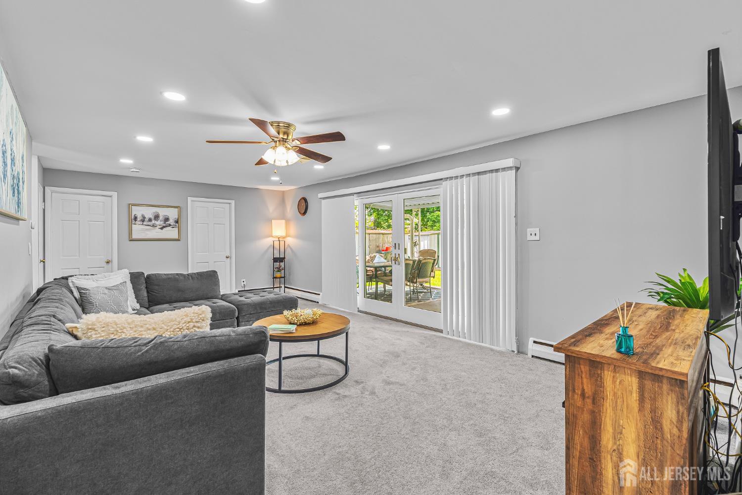 23 Carmello Drive Edison, NJ 08817 - Photo 12 of 28 a living room with furniture and a window