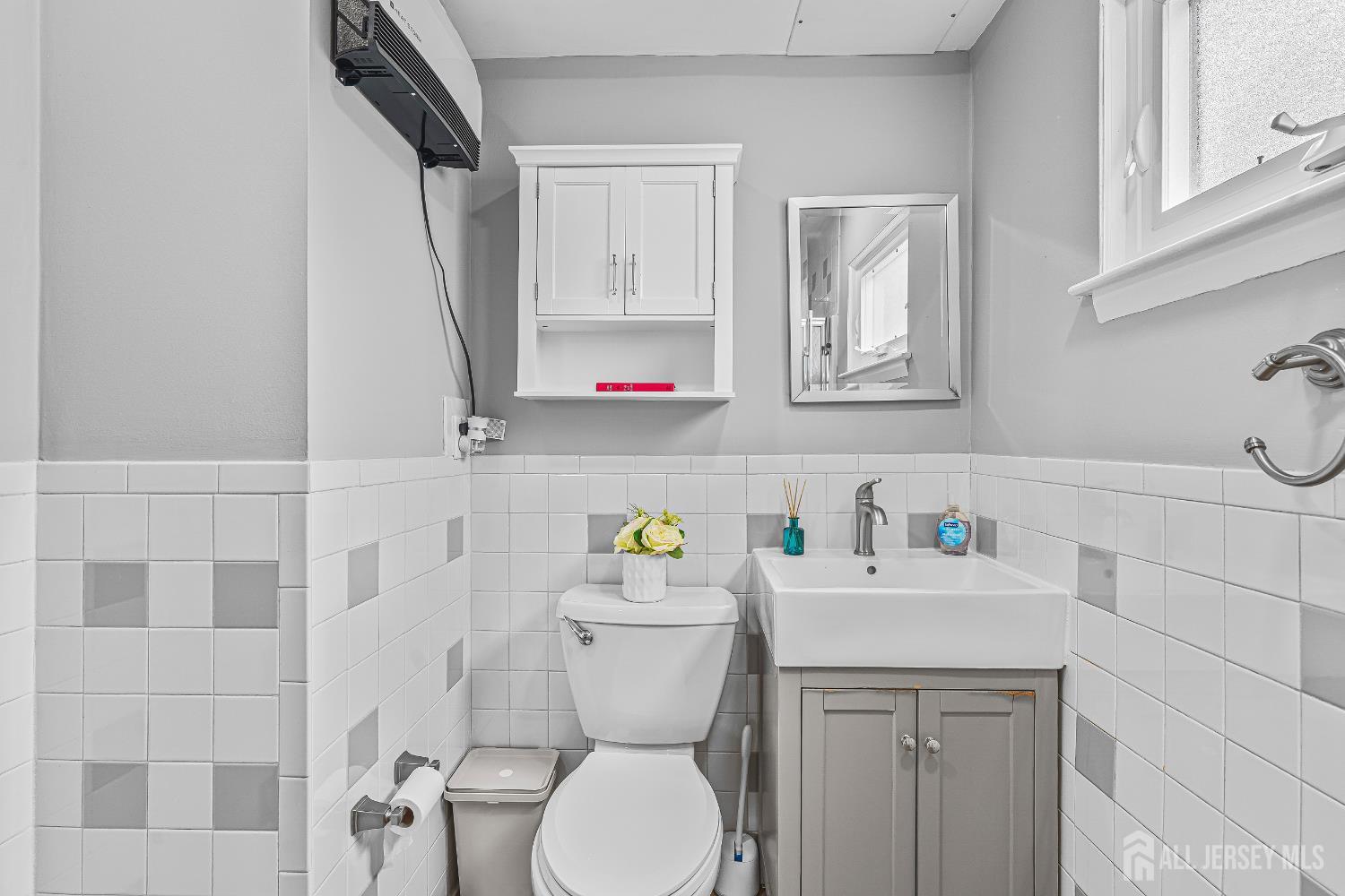 23 Carmello Drive Edison, NJ 08817 - Photo 14 of 28 a bathroom with a sink toilet and shower