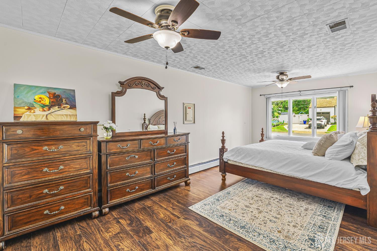 23 Carmello Drive Edison, NJ 08817 - Photo 17 of 28 a bedroom with a bed and a dresser