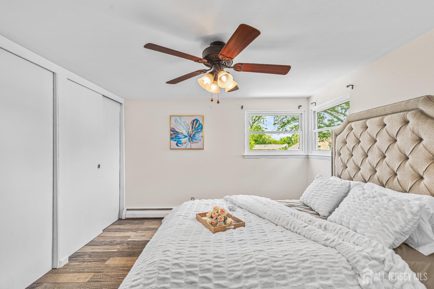 23 Carmello Drive Edison, NJ 08817 - Photo 20 of 28 a bedroom with a bed and a chandelier