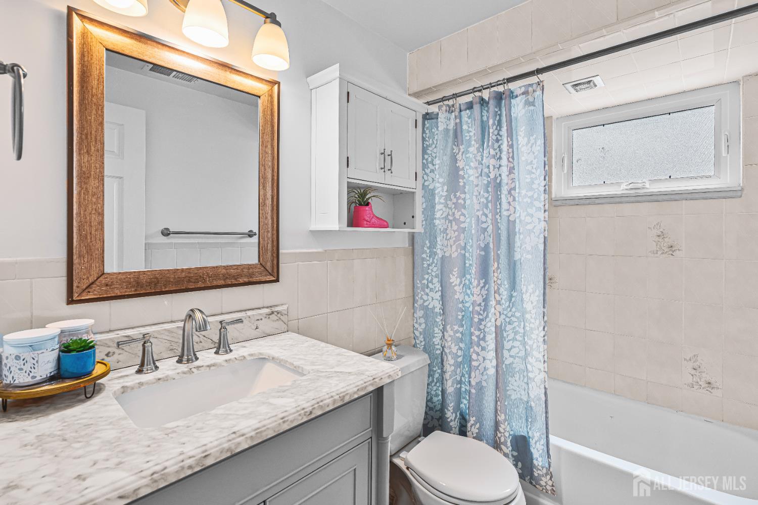 23 Carmello Drive Edison, NJ 08817 - Photo 23 of 28 a bathroom with a granite countertop sink toilet and shower