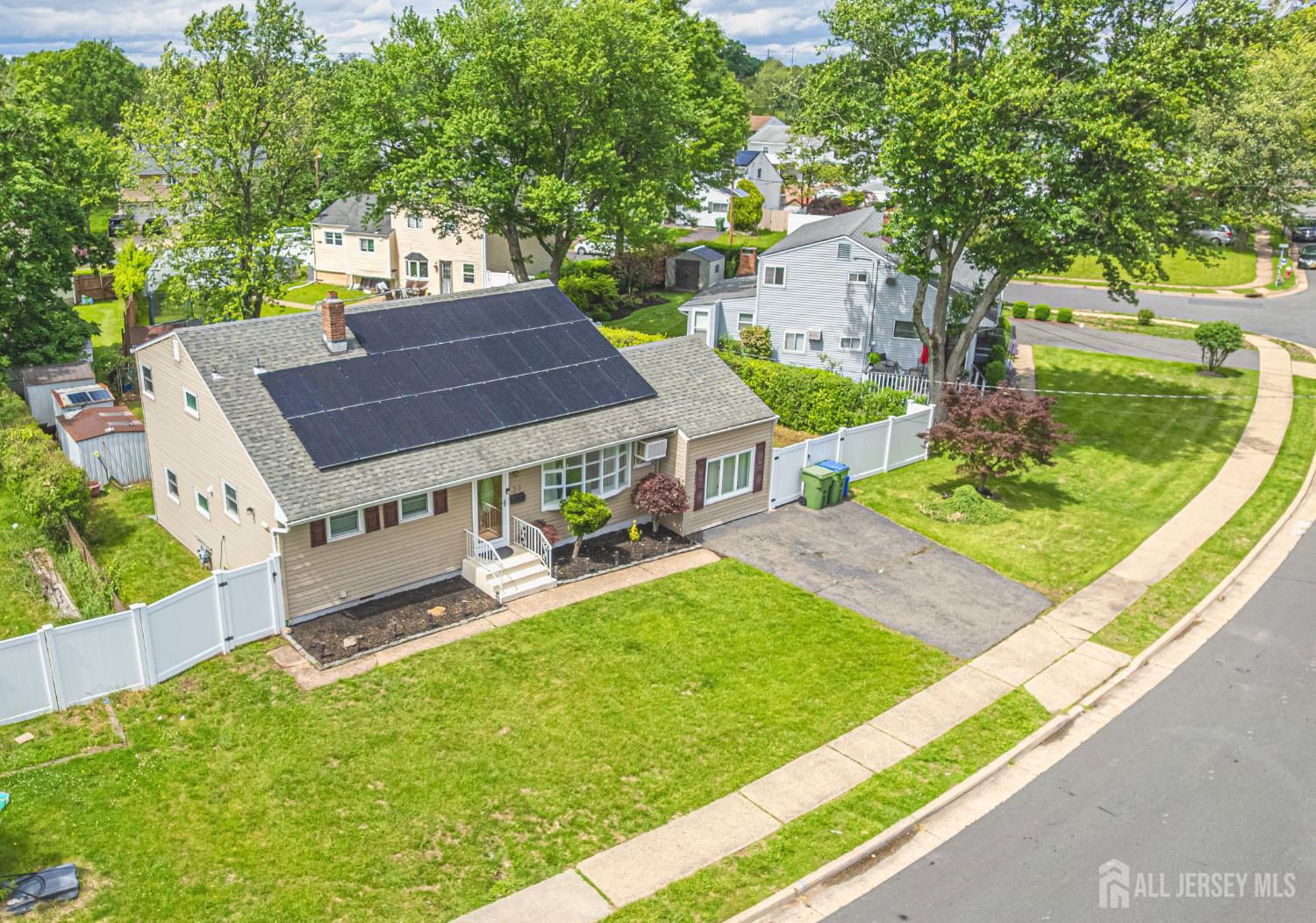 23 Carmello Drive Edison, NJ 08817 - Photo 26 of 28 a front view of a house with garden
