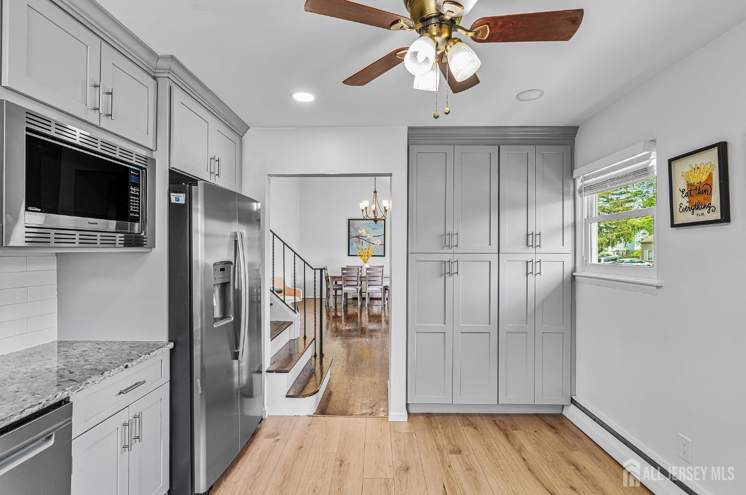 23 Carmello Drive Edison, NJ 08817 - Photo 8 of 28 a view of a kitchen from the hallway
