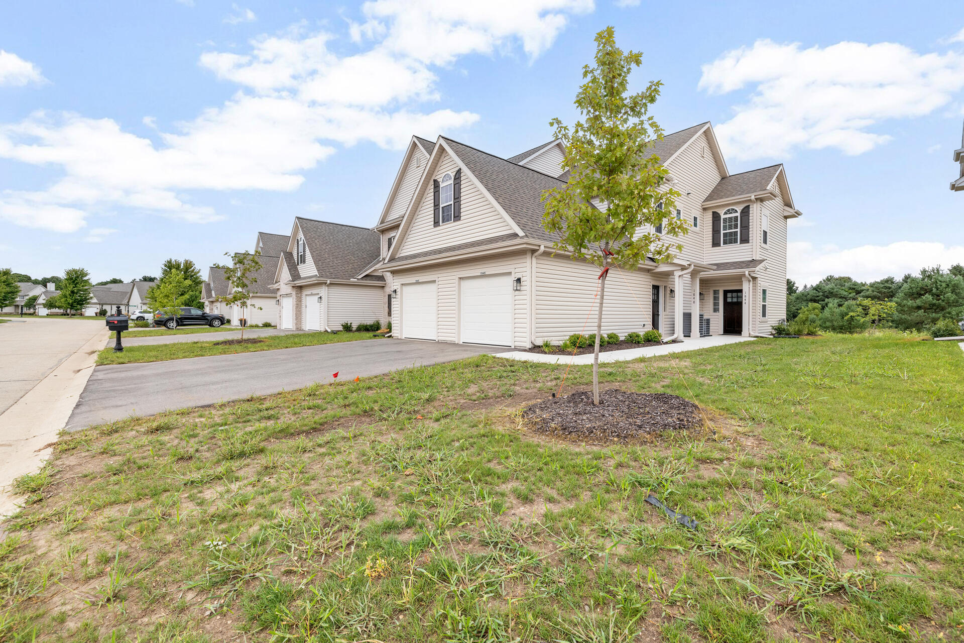 1870 Woodland Way, Unit 4331 Slinger, WI 53086 - Photo 1 of 47 7-Exterior_1887 Woodland Way
