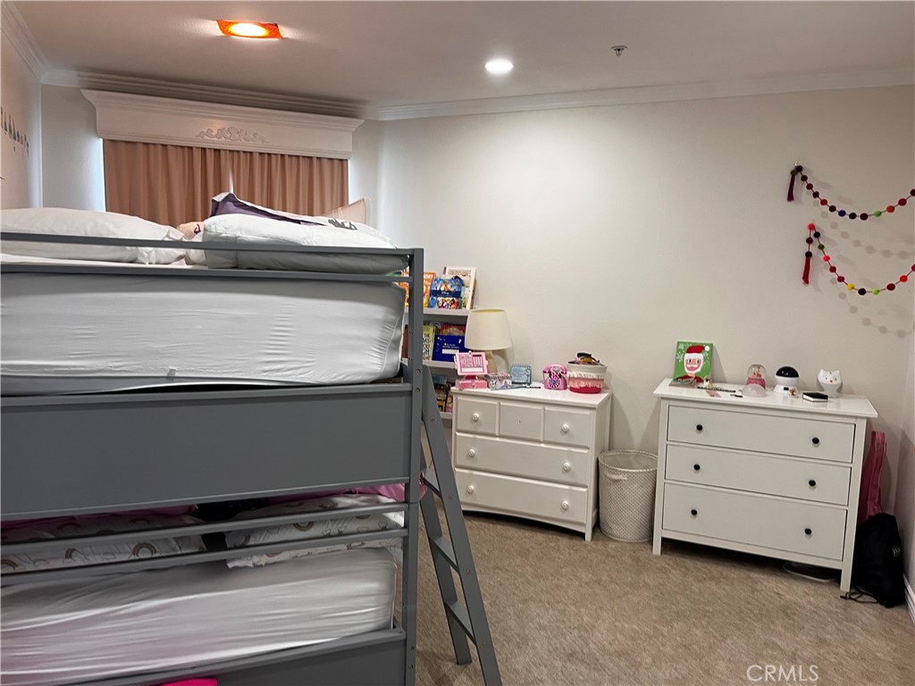 2243 Martin, Unit 409 Irvine, CA 92612 - Photo 14 of 31 a utility room with cabinets and wooden floor