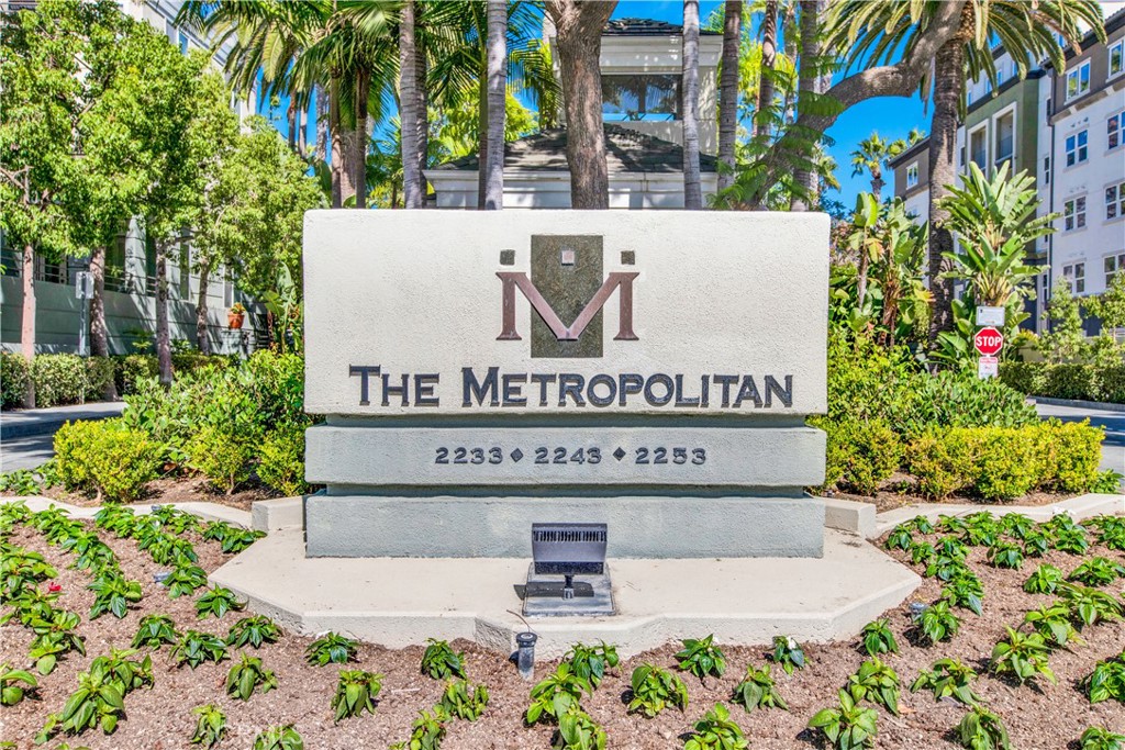 2243 Martin, Unit 409 Irvine, CA 92612 - Photo 21 of 31 a view of outdoor space with signage and flags