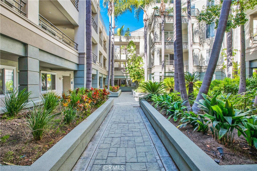 2243 Martin, Unit 409 Irvine, CA 92612 - Photo 22 of 31 a view of a pathway both side of the house