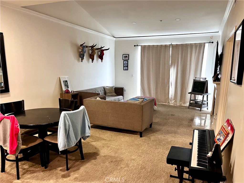 2243 Martin, Unit 409 Irvine, CA 92612 - Photo 3 of 31 a living room with furniture and a window