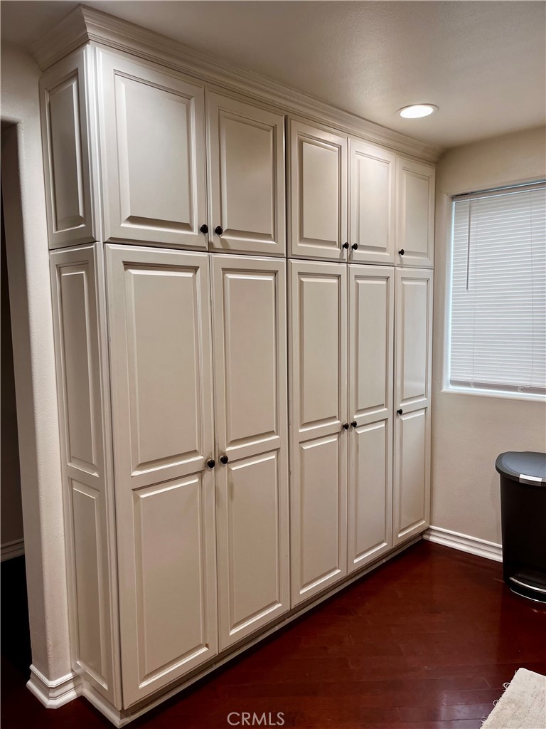 2243 Martin, Unit 409 Irvine, CA 92612 - Photo 6 of 31 a view of an empty room with wooden floor