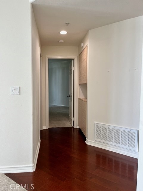 2243 Martin, Unit 409 Irvine, CA 92612 - Photo 7 of 31 a view of empty room with wooden floor