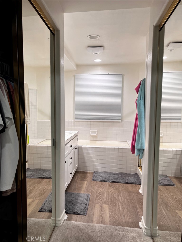 2243 Martin, Unit 409 Irvine, CA 92612 - Photo 10 of 31 a bathroom with a tub and shower