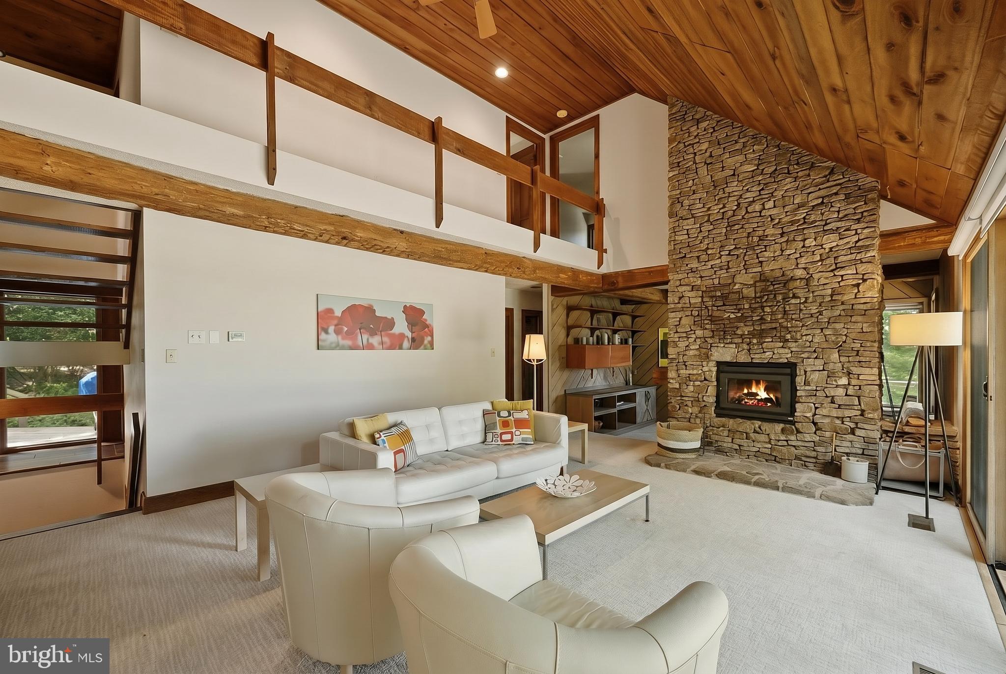 1250 Pergin Farm Road Oakland, MD 21550 - Photo 27 of 107 Beautiful Stone fireplace separates the den and LR