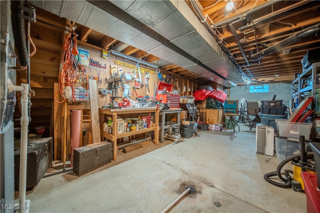 3447 Marian Road Ravenna, OH 44266 - Photo 27 of 35 Basement with a workshop area