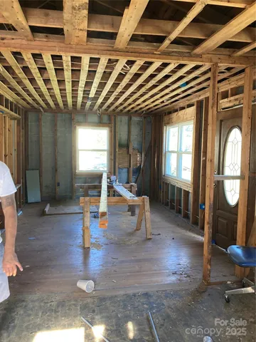 a bathroom with a tub and shower