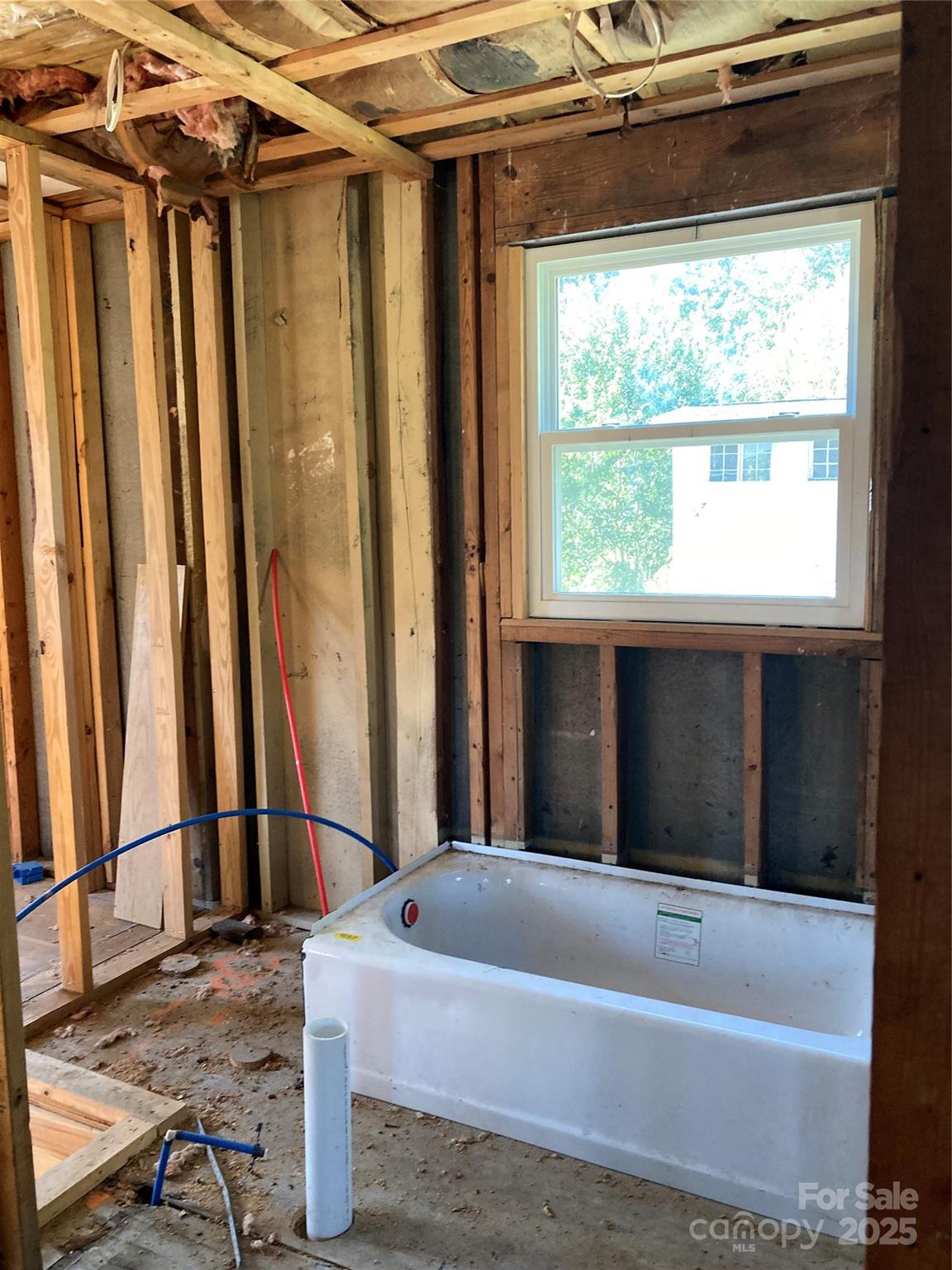 6230 Old Mocksville Road Salisbury, NC 28144 - Photo 4 of 8 a bathroom with a tub and shower
