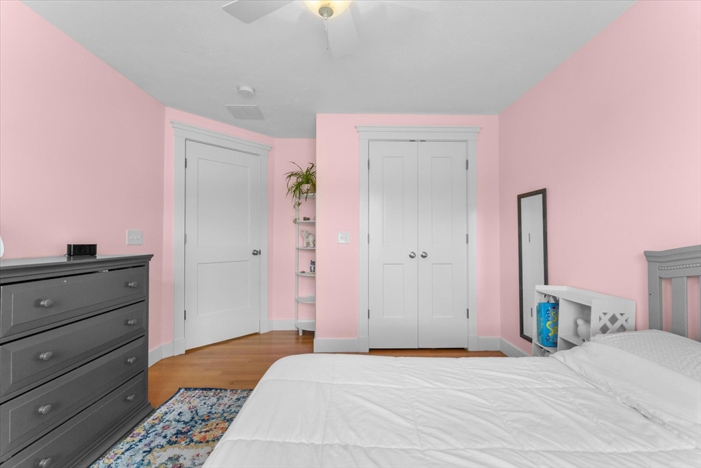 50 Quabbin Path Sutton, MA 01590 - Photo 31 of 42 a bedroom with a bed and a dresser