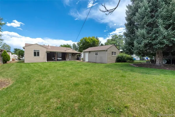 a house view with a garden space