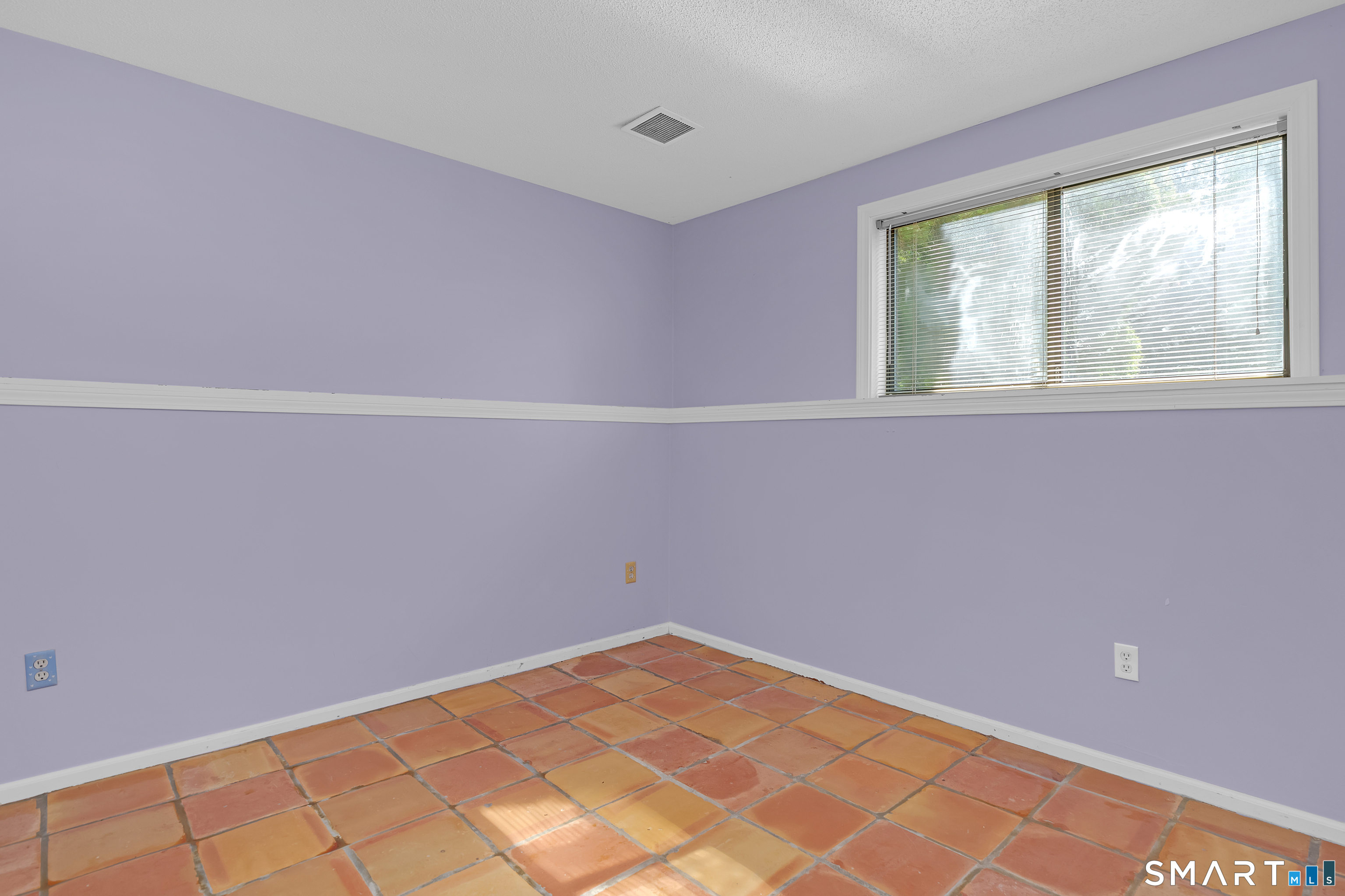 90 Bell Street Manchester, CT 06040 - Photo 23 of 40 a view of an empty room with a window