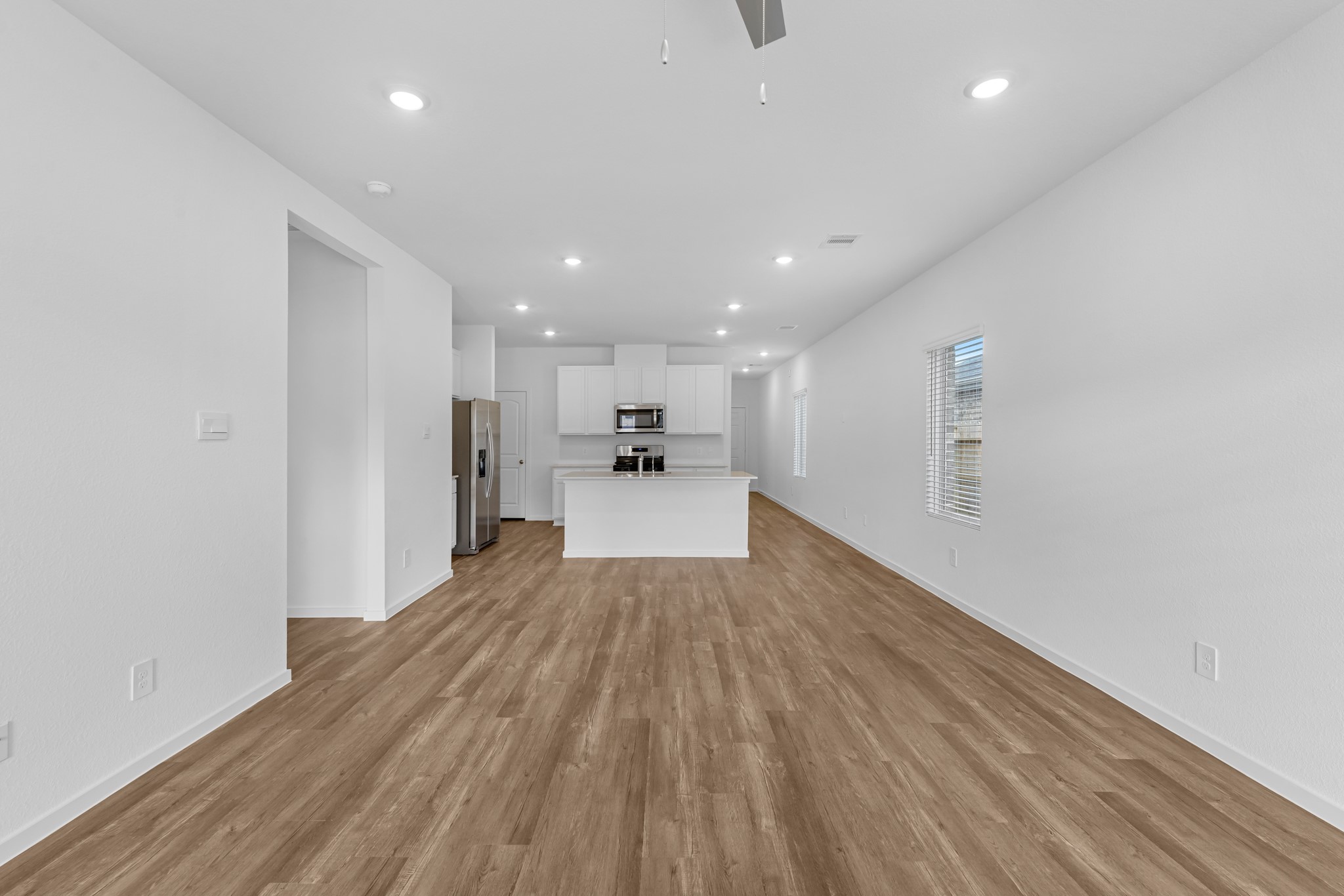 21915 Terre Riviera Drive Hockley, TX 77447 - Photo 14 of 33 a view of kitchen with wooden floor