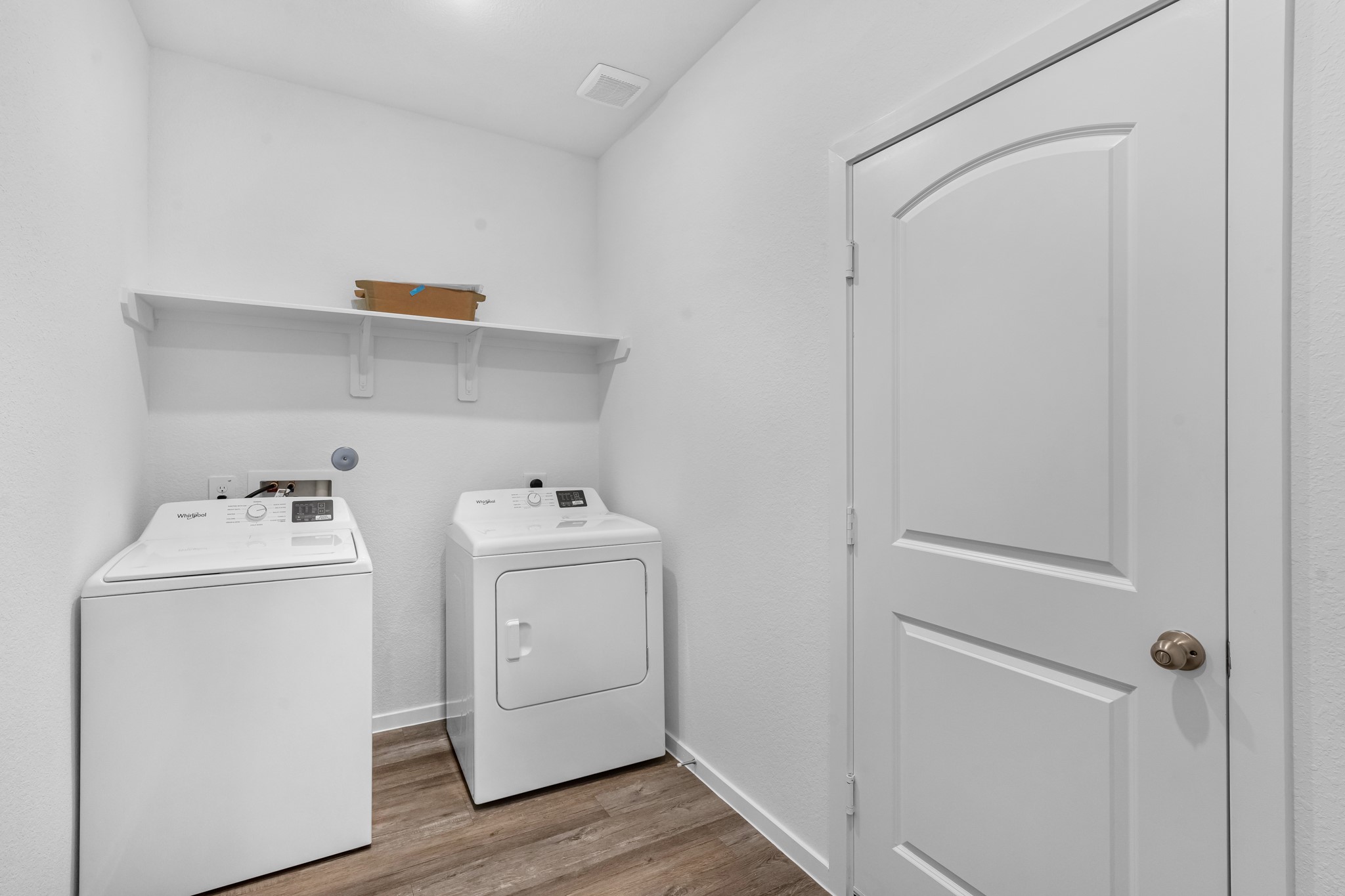 21915 Terre Riviera Drive Hockley, TX 77447 - Photo 15 of 33 a view of storage and utility room with washer and dryer