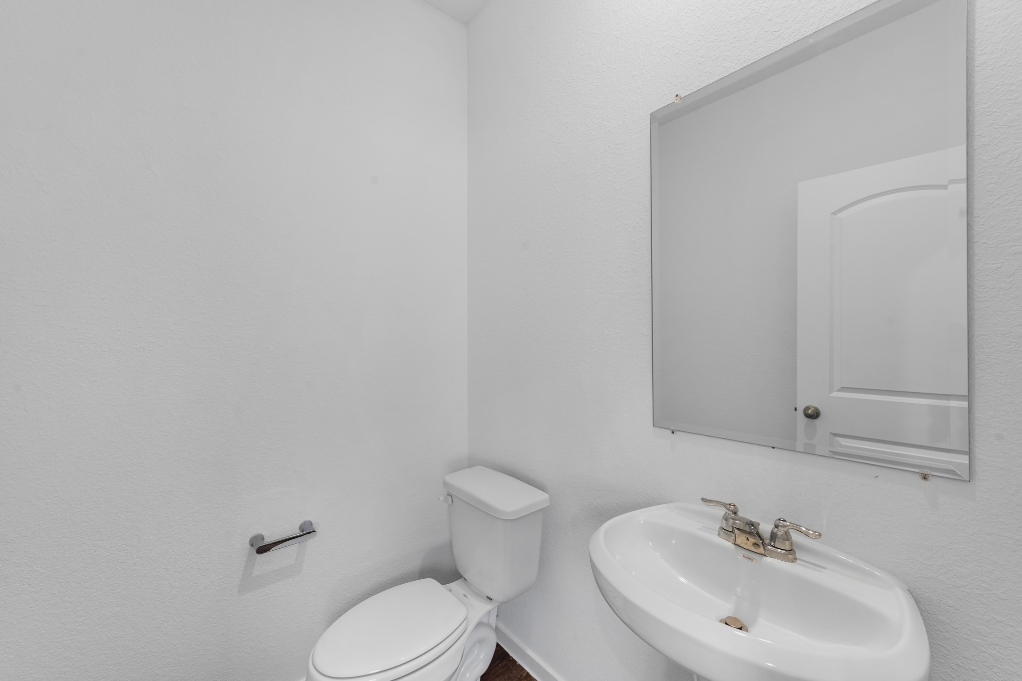 21915 Terre Riviera Drive Hockley, TX 77447 - Photo 16 of 33 a bathroom with a sink mirror and toilet