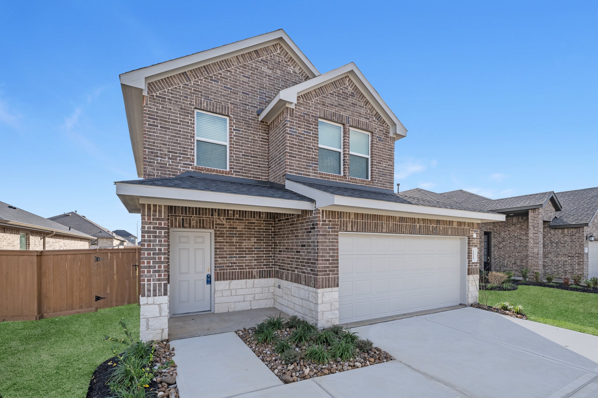 21915 Terre Riviera Drive Hockley, TX 77447 - Photo 2 of 33 a front view of a house with garden