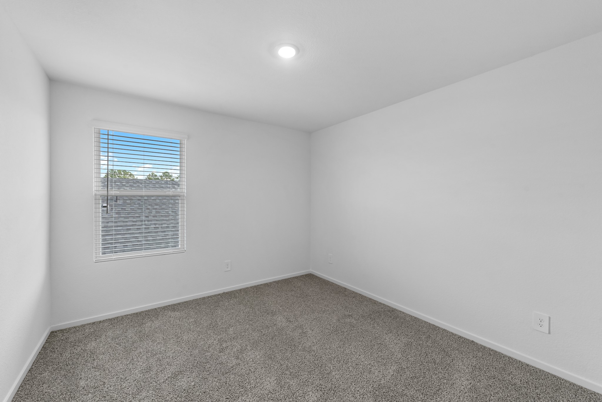 21915 Terre Riviera Drive Hockley, TX 77447 - Photo 29 of 33 an empty room with a window
