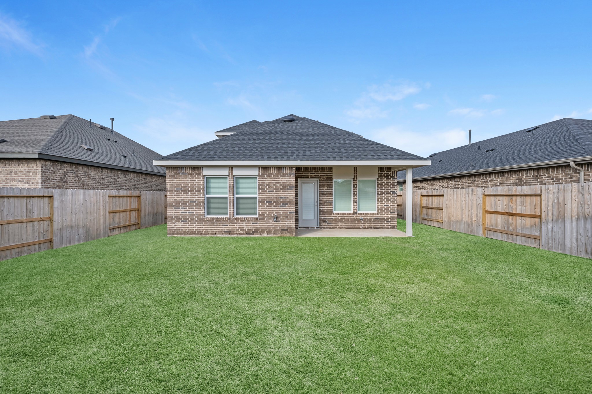 21915 Terre Riviera Drive Hockley, TX 77447 - Photo 33 of 33 a view of a yard in front of a house with large trees