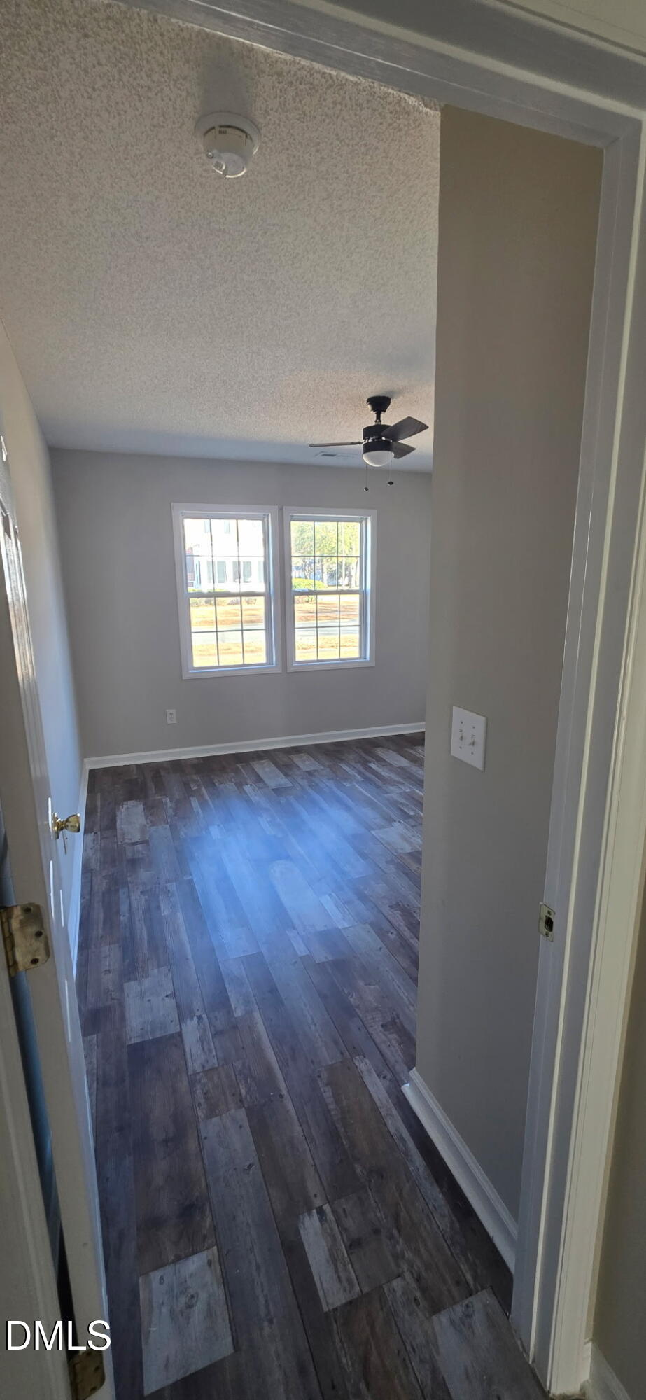 601 West Anderson Street Selma, NC 27576 - Photo 6 of 7 a view of an empty room and window