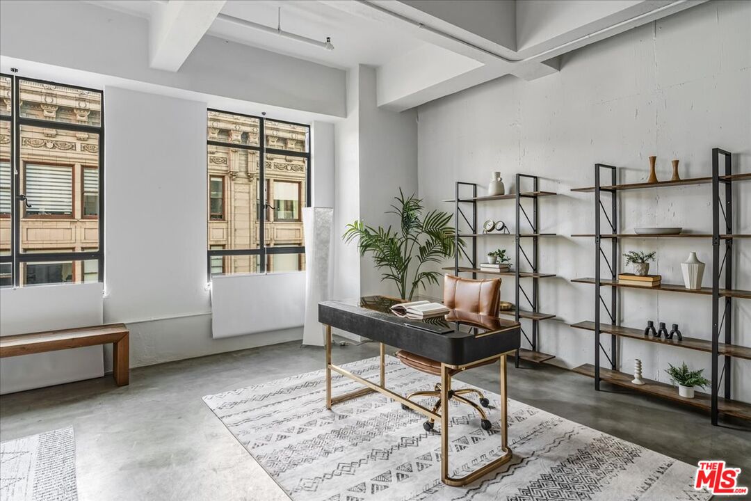849 South Broadway, Unit 604 Los Angeles, CA 90014 - Photo 9 of 43 a workspace with furniture and window